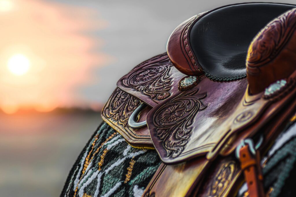 Western saddle & sunset